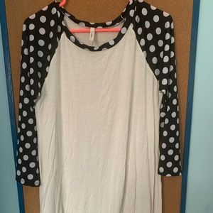 White polka dot tunic.